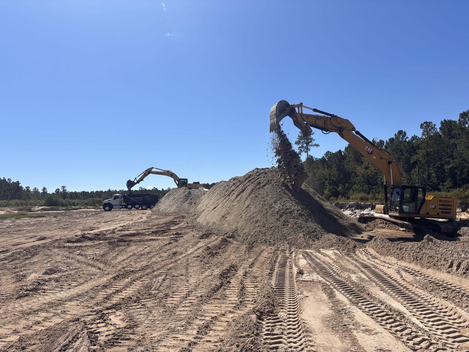 Excavator loading material at Sandhill Mine